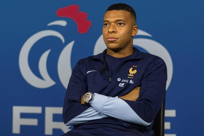 Umupolisi yahagaritswe nyuma yo guhabwa amafaranga na Kylian Mbappé